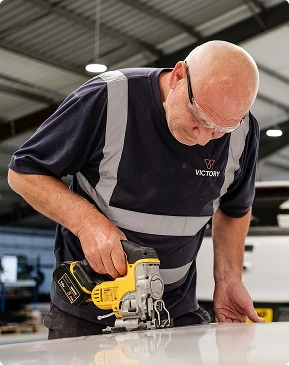 worker building a car